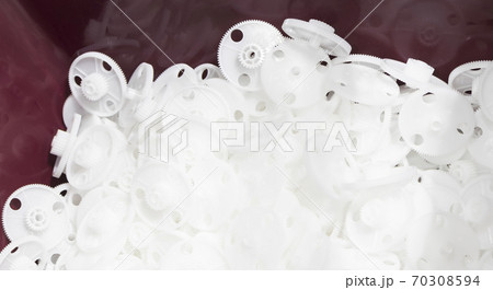 white plastic gear made by injection process 70308594