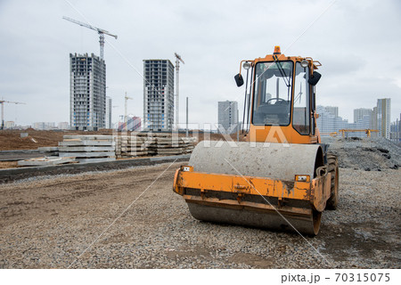 Soil Compactor at construction site. Vibration single-cylinder road roller  70315075
