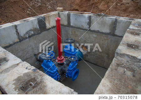 Gate valves in valve pit of the underground piping networks. Gate valves in valve pit of the underground piping networks. 70315078