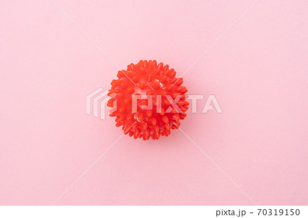 model of Coronavirus disease COVID-19 on pink back model of Coronavirus disease COVID-19 on pink back 70319150