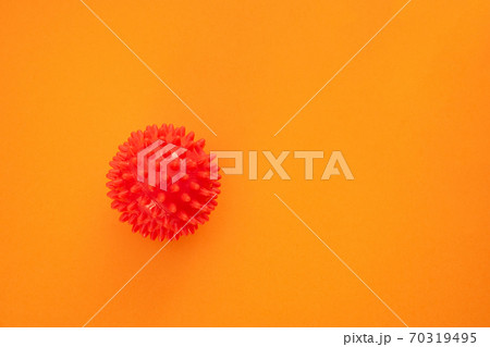 on orange model of Coronavirus disease COVID-19 on orange model of Coronavirus disease COVID-19 70319495