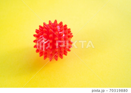 COVID-19 model of Coronavirus disease on yellow COVID-19 model of Coronavirus disease on yellow 70319880
