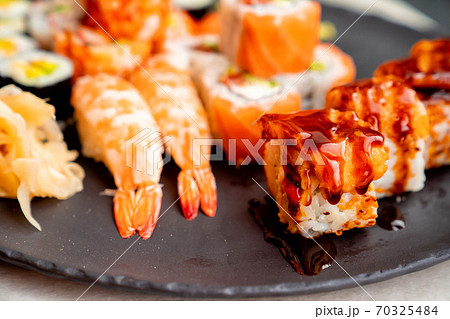 Rolls with salmon, shrimp and caviar Rolls with salmon, shrimp and caviar 70325484