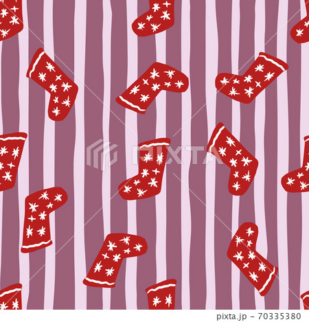 Seamless winter pattern with hand drawn christmas socks shapes. Red random located new year elements on purple stripped background. Seamless winter pattern with hand drawn christmas socks shapes. Red random located new year elements on purple stripped background. 70335380