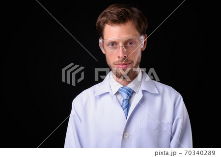 Portrait of bearded man doctor as scientist Portrait of bearded man doctor as scientist 70340289