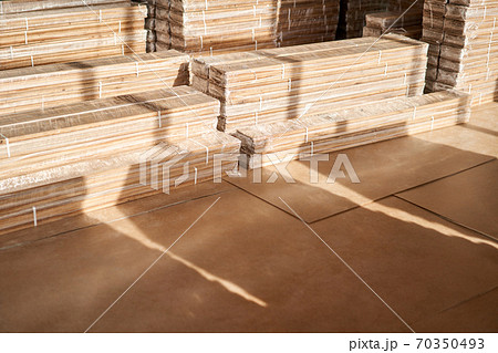 Panels of the parquet floor. Plywood boards on the industry. Preparation for the flooring of the parquet floor. Restoration of the floor in a restaurant or apartment. Panels of the parquet floor. Plywood boards on the industry. Preparation for the flooring of the parquet floor. Restoration of the floor in a restaurant or apartment. 70350493