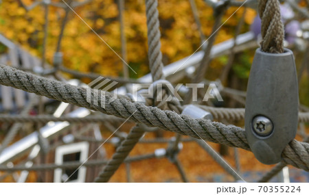 Rope climbing toys for kids in outdoor playground. 70355224