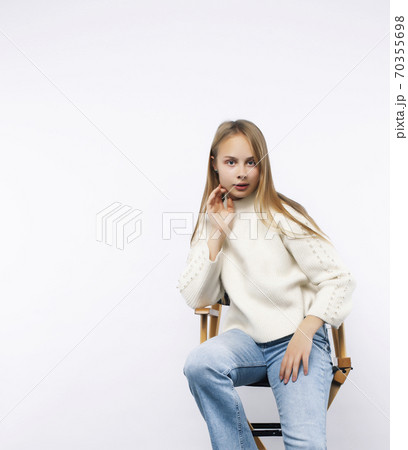 young pretty blonde hair woman happy smiling isolated on white background, lifestyle people concept young pretty blonde hair woman happy smiling isolated on white background, lifestyle people concept 70355698