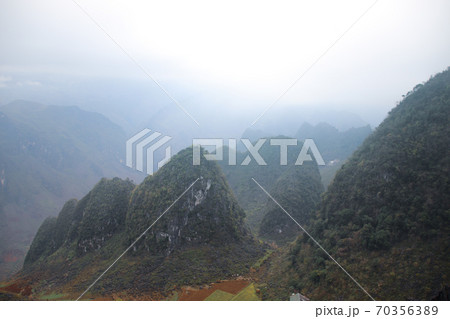 Cinematic landscape scenery of mountains in Dong Van Karst Plateau Geopark in Sa phin, Vietnam 70356389