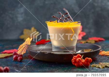 Homemade pumpkin panna cotta with orange jelly. 70357095