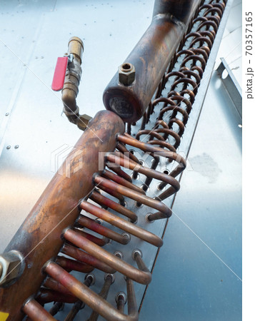 Brass heat radiator and industrial cooler detail Brass heat radiator and industrial cooler detail 70357165