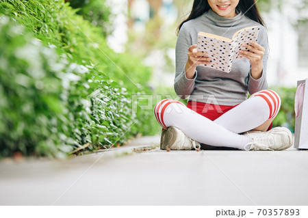 Reading captivating book 70357893