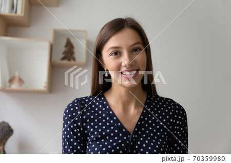 Profile portrait photo of young smiling beautiful woman. Profile portrait photo of young smiling beautiful woman. 70359980