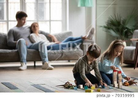 Caucasian family relax at home on weekend Caucasian family relax at home on weekend 70359995