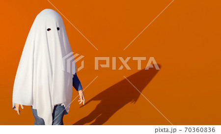 halloween ghost kid orange background white sheet disguise costume 3D illustration 70360836
