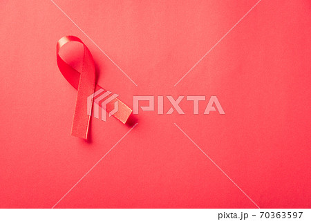 Red bow ribbon symbol HIV, AIDS cancer awareness Red bow ribbon symbol HIV, AIDS cancer awareness 70363597