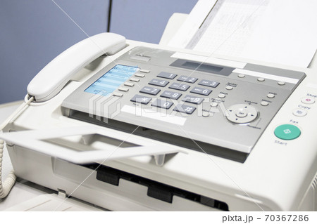 The fax machine use for Sending documents in the office, concept equipment needed in office The fax machine use for Sending documents in the office, concept equipment needed in office 70367286