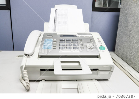 The fax machine use for Sending documents in the office, concept equipment needed in office 70367287