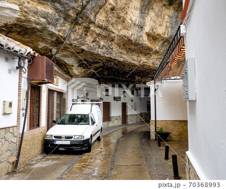 Dwellings built into rock overhangs in Setenil de las Bodegas, Andalusia Spain Dwellings built into rock overhangs in Setenil de las Bodegas, Andalusia Spain 70368993