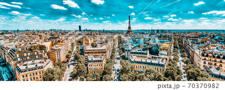 Beautiful panoramic view of Paris from the roof of the Triumphal Arch. Champs Elysees and the Eiffel Tower. Beautiful panoramic view of Paris from the roof of the Triumphal Arch. Champs Elysees and the Eiffel Tower. 70370982