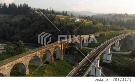 Industrial railroad over the river. 70373179