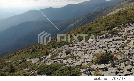 Smooth slope in the mountains. 70373319