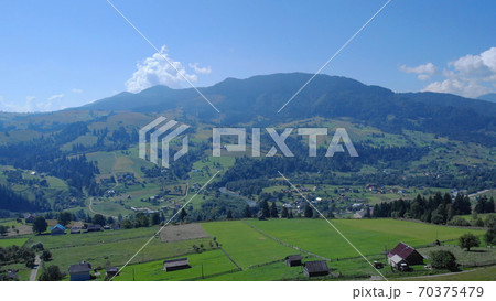 View of rural village in western Ukraine. View of rural village in western Ukraine. 70375479
