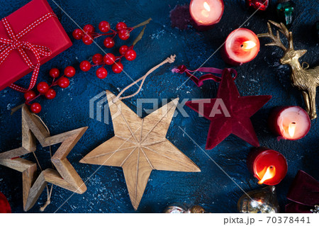 Christmas flat lay scene with golden decorations Christmas flat lay scene with golden decorations 70378441