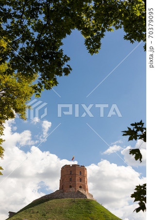 A view of the Gedinimas tower in 2020. A red tower on the hill. 70379095