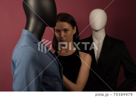 A young girl with problematic skin suffers from loneliness in a society of stylish manikins. 70384979