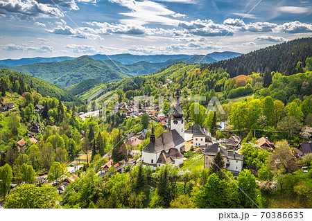 Church in The Spania Dolina village with surrounding landscape, 70386635