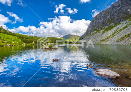 Mountain lake in Rohace area of the Tatra National Park, Slovaki Mountain lake in Rohace area of the Tatra National Park, Slovaki 70386703