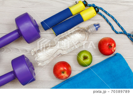 Different tools for fitness on floor in room Different tools for fitness on floor in room 70389789