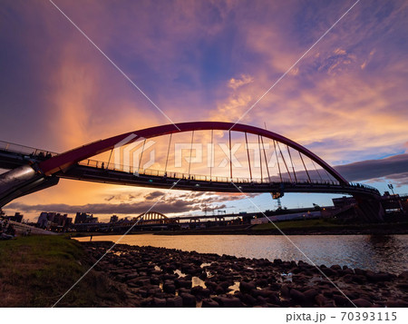 Sunset view of the beautiful Rainbow Bridge Sunset view of the beautiful Rainbow Bridge 70393115