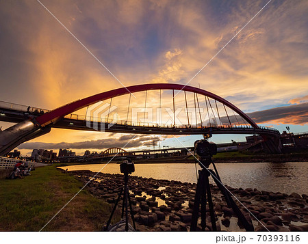 Sunset view of the beautiful Rainbow Bridge Sunset view of the beautiful Rainbow Bridge 70393116