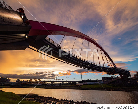 Sunset view of the beautiful Rainbow Bridge Sunset view of the beautiful Rainbow Bridge 70393117