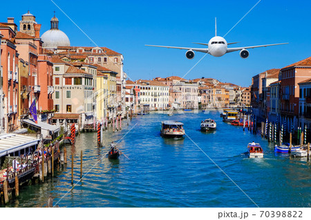 Front of real plane aircraft, on Venice grand canal in Sunrise at Venice, Italy background 70398822