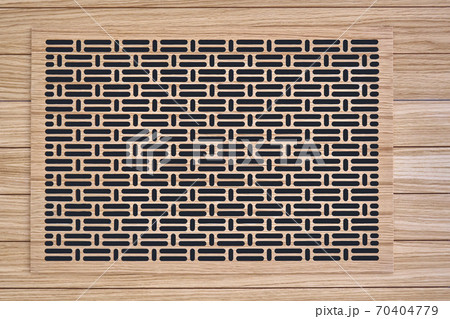 Decorative lattice. Wooden vent cover in wooden slats ceiling 70404779