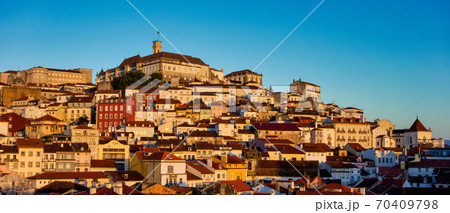 Old town of coimbra glows at night under a pretty summer sky, Portugal Old town of coimbra glows at night under a pretty summer sky, Portugal 70409798