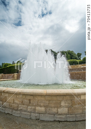 Fountain in The Alnwick Garden, a complex of formal gardens adjacent to Alnwick Castle in the town of Alnwick, Northumberland, England 70413735