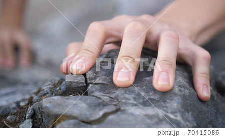 Mountain Climber Man Reaching The Top Doing His Best. 70415086