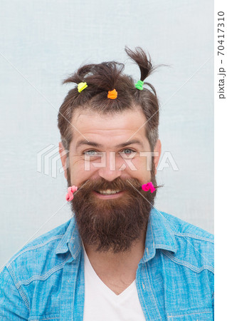 I am my own stylist. Funny portrait of man with funny hairstyle.  70417310