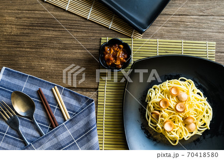 Spaghetti pasta with sausage and tomato sauce 70418580