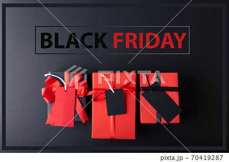Black Friday sale concept. Red Sale tag and Black Sale tag color on the black background with Copy space. Black Friday weekend Black Friday sale concept. Red Sale tag and Black Sale tag color on the black background with Copy space. Black Friday weekend 70419287
