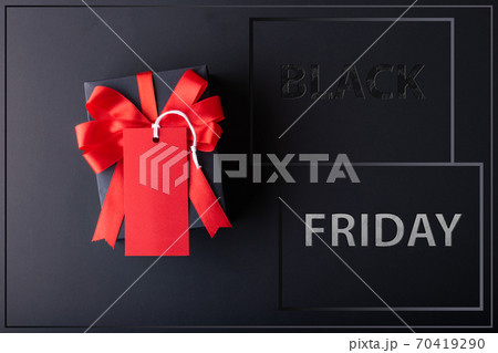 Black Friday sale concept. Red Sale tag  and Black Sale tag color on the black background with Copy space. Black Friday weekend 70419290