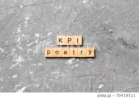 KPI poetry word written on wood block. KPI poetry text on table, concept KPI poetry word written on wood block. KPI poetry text on table, concept 70419511