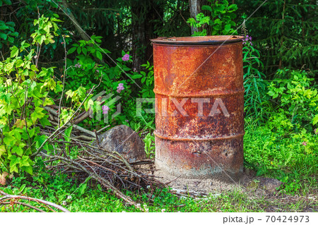 Old rusty barrel. Old rusty barrel. 70424973