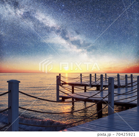 Good views of the White pier under the stars used to natural background Sea. 70425921