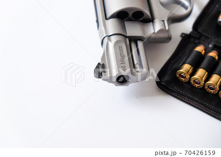 .44 revolver magnum gun with jacket hallow point bullet 70426159