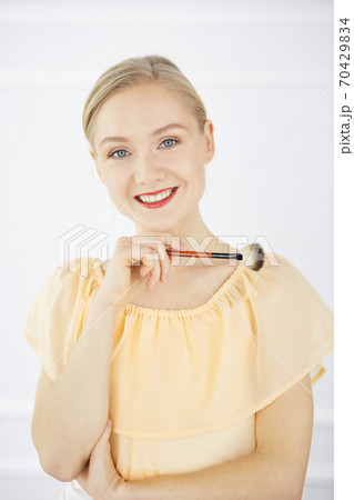 Happy young woman smiling at camera. The best moments of your life 70429834